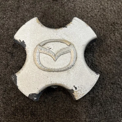 Tapa central de llantas de aleación Mazda Miata 97 98 99 00 Foto 1 de 4