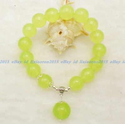 Natural 8/10/12mm Green Peridot Round Gemstone Beads Pendant Bracelet 7.5" AAA - Image 1 of 4