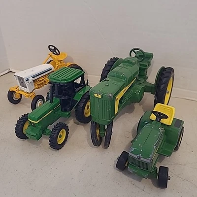 ERTL International Cub John Deere Lot Of 4 Diecast Tractor 1:16 Scale - Image 1 of 4