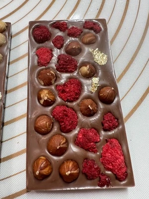 Milk Chocolate Bar With Fruits & Nuts taste full Hazelnut Raspberry & Gold 100g. - Image 1 of 4