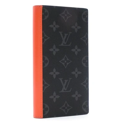 Cartera Louis Vuitton Brazza Monograma Eclipse Salida del Sol Naranja Doble Plegable M25846 Negra Foto 1 de 4
