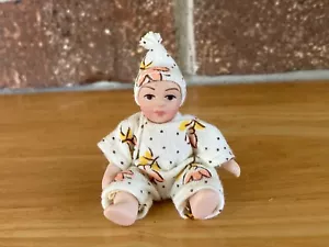 1:12 scale New Dollhouse Miniature Porcelain Baby Toddler In Romper and cap - Picture 1 of 7