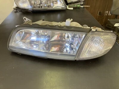 Faro lateral izquierdo del conductor Mazda Millennia 1997-2000 con luz indicadora Foto 1 de 4