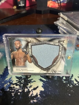 Jon Jones /120 MAT RELIC FROM UFC 159 EVENT USED 2014 Topps UFC Bloodlines - Image 1 of 2