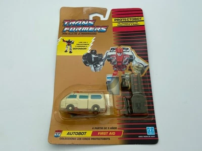 Transformers G1 1990 First-Aid Defensor classic gold MOSC Europe MB hasbro - Image 1 of 4