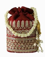 Raw-Silk Designer Potli Bag for women Golden Embroidery and Pearl Handle Tassel