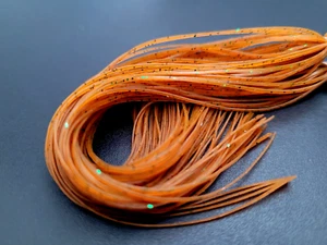 RUBBER SILICONE LEGS - Fly Tying Material - PUMPKIN/ GREEN FLEC - 50 Legs - NEW! - Picture 1 of 2