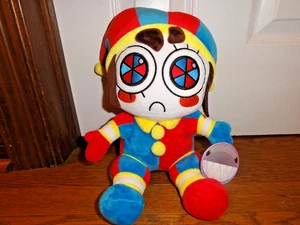POMNI EL INCREÍBLE CIRCO DIGITAL 12" PELUCHE OFICIAL FALLO LICENCIADO con ETIQUETAS - Imagen 1 de 14