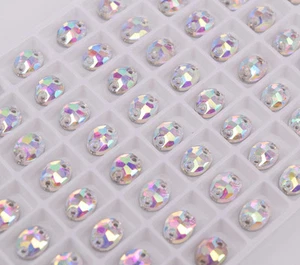 Strass 6x8 mm cristallo ovale cucito su vetro AB bianco perline schienale piatto cucito su pietra - Foto 1 di 6