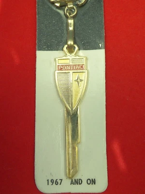 LLAVE CRESTA DORADA PONTIAC 1967 1971+ De colección NOS Bonneville Grand Prix GTO Firebird Foto 1 de 4
