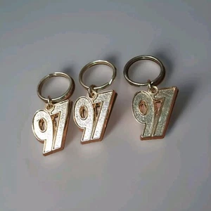 Lot Of 3 vintage 1997 gold / metal keychain. - Picture 1 of 5