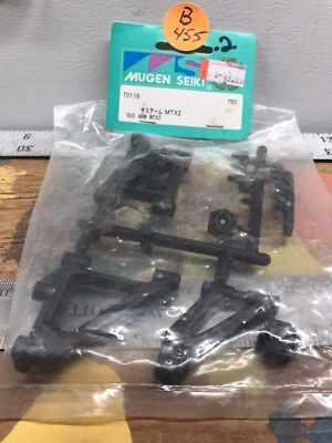 Brazo de suspensión Mugen Seiki T0118: MTX2 nuevo en paquete enviado a EE. UU. Foto 1 de 4