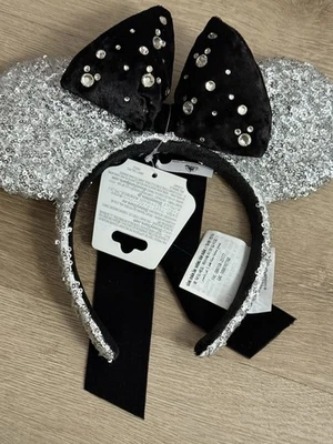 Diadema navideña plateada y negra de los parques de Disney 2025 WDW orejas nueva Foto 1 de 2