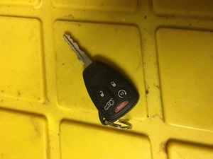 OEM CHRYSLER DODGE JEEP master keyless entry remote fob transmitter - Picture 1 of 2