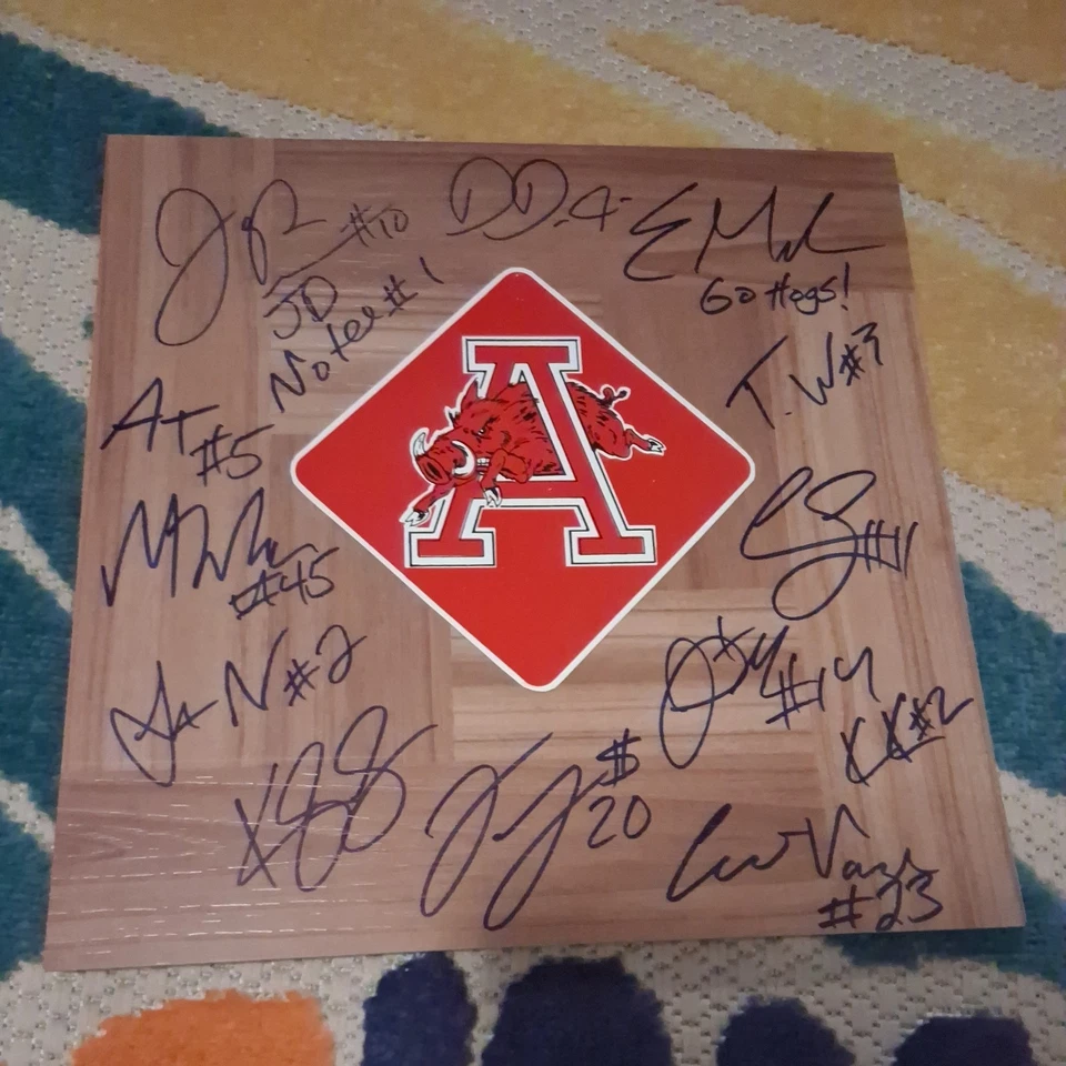 Arkansas Razorbacks 2021-22 Team Signed Floorboard AUTOGRAPHED BY ENTIRE TEAM - Image 1 of 4