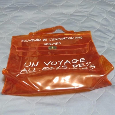 Bolso Kelly de Vinilo Hermès Transparente Naranja Bolso de Mano de Diseñador Herrajes Dorados PVC Foto 1 de 4