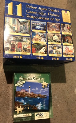 Lot 12 Puzzles - 1 New - Sure Lox, Karmin Int. Eduardo Camoes Portland Lghthouse - Image 1 of 3