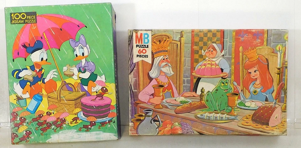 Puzzle Lote 2 Margaritas y Pato Donald (100 piezas), Milton Bradley Princesa y Rana (60) Foto 1 de 1