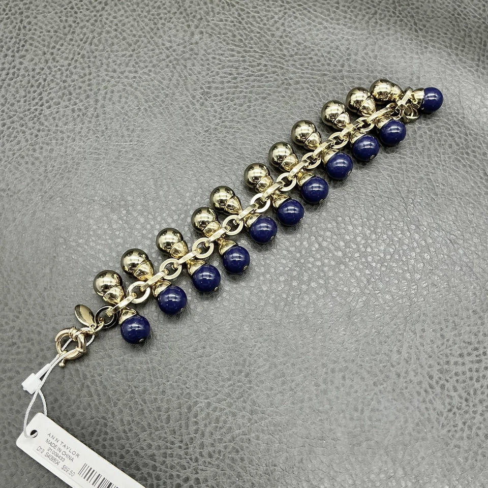Pulsera Ann Taylor llamativa con cuentas para mujer talla única tono dorado azul marino Foto 1 de 4