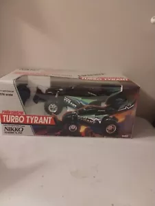 RADIOCOMANDO VINTAGE NIKKO 1/16. SCALA TURBO TIRANNO. NUOVO IN CONFEZIONE - Foto 1 di 9