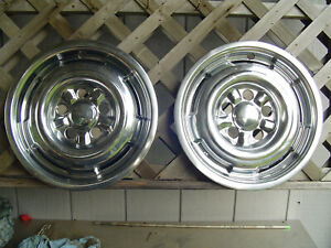 TWO MERCURY COMET CYCLONE MARAUDER HUBCAPS WHEEL COVERS CENTER CAPS VINTAGE FORD
