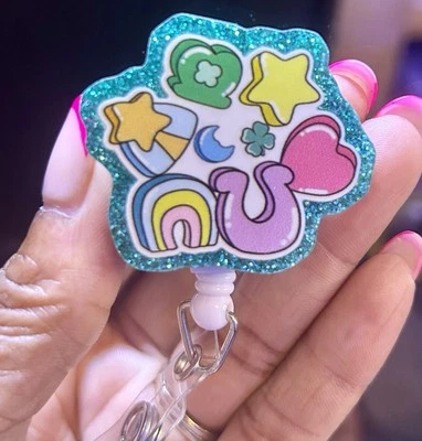 Carrete de insignia divertido, amuletos de la suerte, enfermera pediátrica, enfermera, tecnología, identificación de carrete Foto 1 de 2