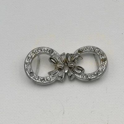 Antiguo cinturón victoriano hebilla 2 piezas entrelazado tono plata arco pedrería Foto 1 de 4