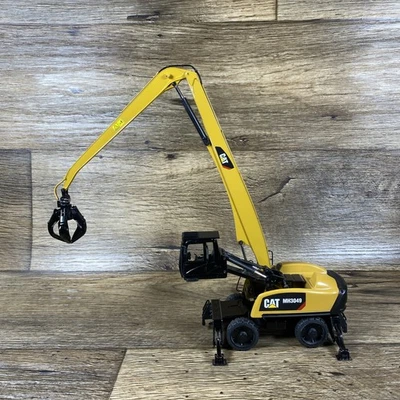 1:50 Tonkin Replicas TR40001 CAT MH3049 Material Handler Pre Owned - Image 1 of 4