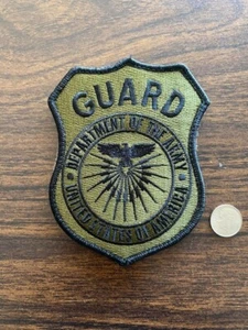 U.S. ARMY GUARD SHOULDER PATCH - FOR CIVILIAN  GUARD (WOODLAND SUBDUED) HOOK REV - Picture 1 of 1
