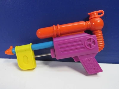 Pistola de agua vintage MINI SUPER SOAKER PISTOLA juguete FUNCIONA RARA 4.5" - Imagen 1 de 3