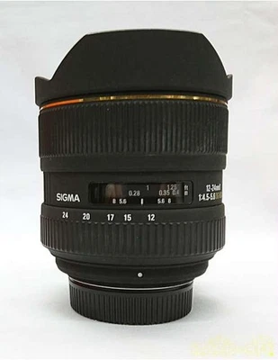 SIGMA AF-MF 12-24MM F4.5-5.6 DG HSM Standard Zoom Lens NIKON - Image 1 of 4