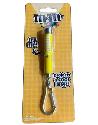 Llavero Proyector Láser M&M's Amarillo Publicidad Logo Coleccionable Medias Stuf Foto 1 de 4