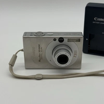 Canon PowerShot Digital ELPH SD1000 7.1MP Digital Camera - Silver Foto 1 de 4