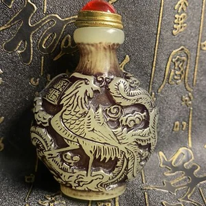 Ancient Chinese beautifully carved dragon and phoenix luminous snuff bottle - Picture 1 of 6