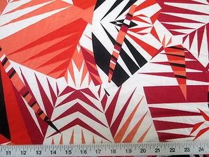 Discount Fabric Printed Spandex Stretch Orange Black Bamboo Leaves A300 - Picture 1 of 1
