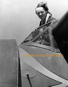 8" By 10" Photo Reprint of Amelia Earhart, Hair Blowing, Posing In Her Aircraft - Picture 1 of 1