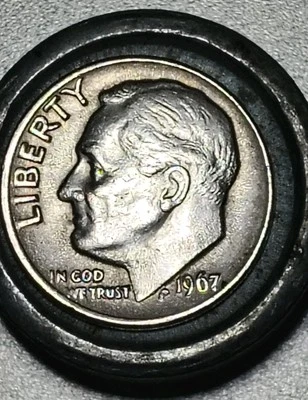 Moneda de diez centavos de error 1967/fondo de explosión de campo de hierba anverso y letras DD de revoluciones  Foto 1 de 4