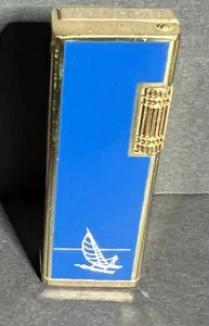 Vintage Bravo Lighter Korea Sailboat Print 2 1/2” Tall Slim Lighter - Picture 1 of 17