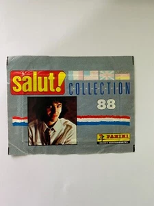 BUSTINA FIGURINE PANINI SALUT COLLETION 88 JEAN JACQUES GOLDMAN PIENA SIGILLATA - Foto 1 di 2