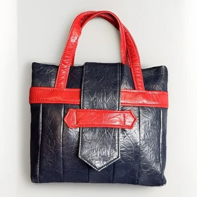 Bolsa de mão vintage década de 1970 década de 1960 acolchoada vinil vermelha azul marinho mod exclusiva MCM - Imagem 1 de 4