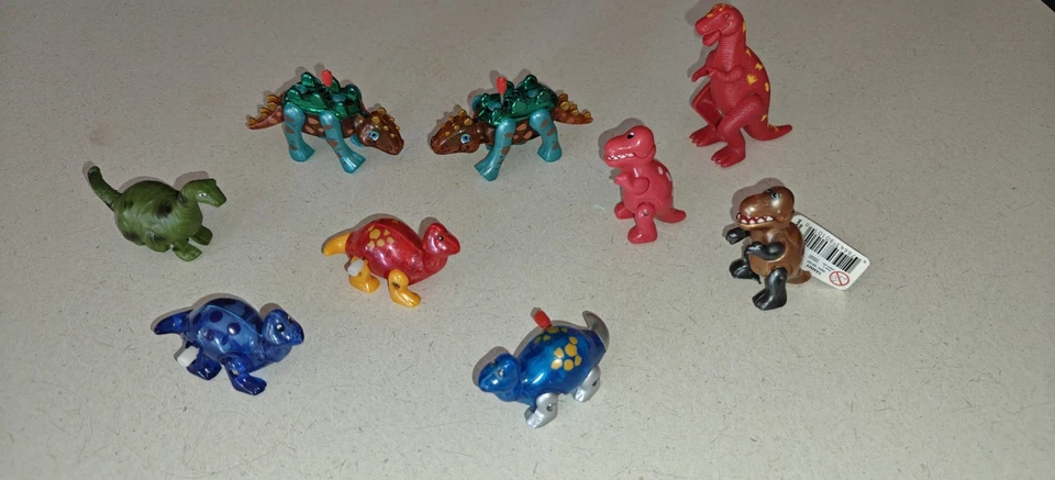 9 - Tomy & Other Wind Up Toy Dinosaurs - Image 1 of 1