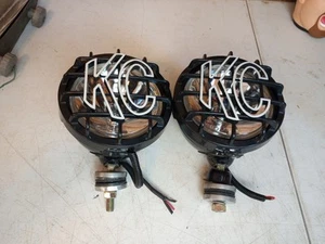 Vintage KC Black Body Hilites Pair 2 With 4213 Bulbs "TESTED" Working - Picture 1 of 13