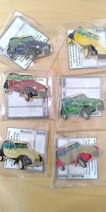 Geocoin Ente Citröen (6 Coins) - Bild 1 von 2