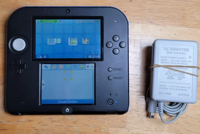 Nintendo 2DS 64GB W/ Charger US Version - Image 1 of 3