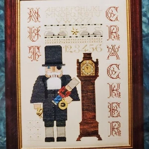 The Nutmeg Needle Nutcracker Sampler II Grandfather Clock Cross Stitch Chart 703 - Picture 1 of 5