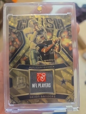 2024 Panini SPECTRA Crush Deion Sanders  gold vinyl 1/1 NFL Players patch - Image 1 of 4