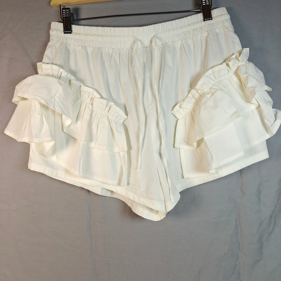 Шорты с кремовыми оборками Story On эластичные на талии на шнурке размер M - Изображение 1 из 4