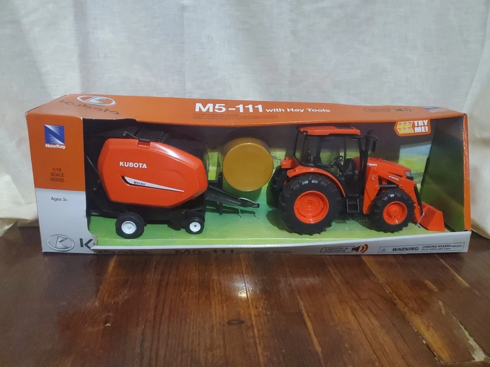New Ray 1/18 Plastic Kubota M5-111 Tractor with Hay Baler & Sounds SS-33033 - Image 1 of 4