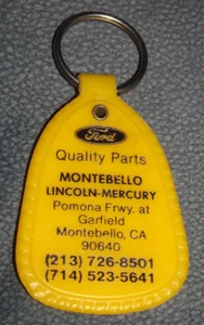 VG Vintage Montebello Lincoln Mercury Keyring Plastic Yellow 213 Area Code 3.25" - Picture 1 of 2