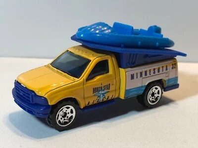 MATCHBOX FORD F SERIES TRUCK w/ RAFT YELLOW MINNESOTA ACROSS AMERICA SERIES  - Image 1 of 4